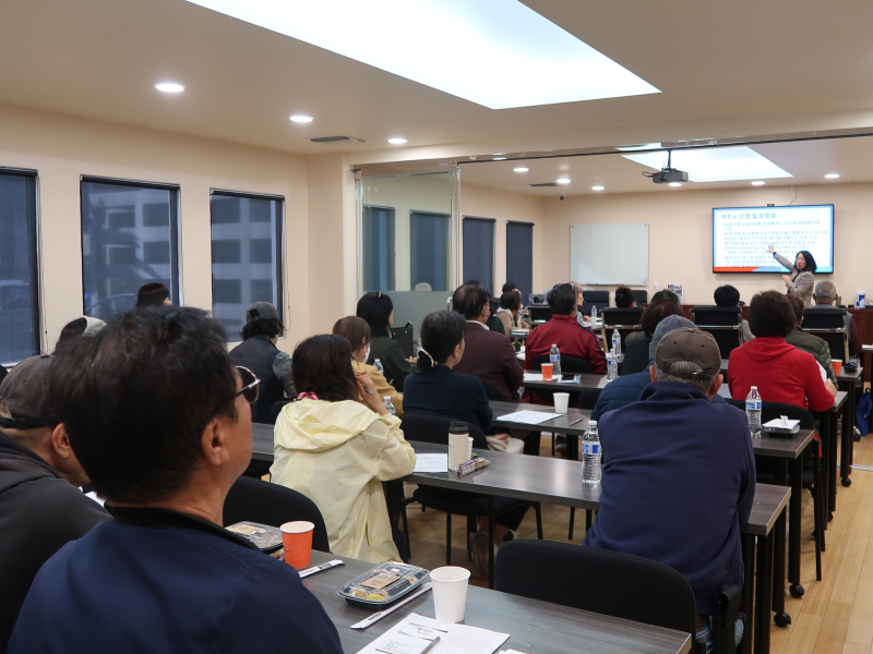 A health educator leads a workshop session, guiding participants through prevention strategies and community resources.