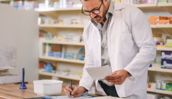 Pharmacist in action.
